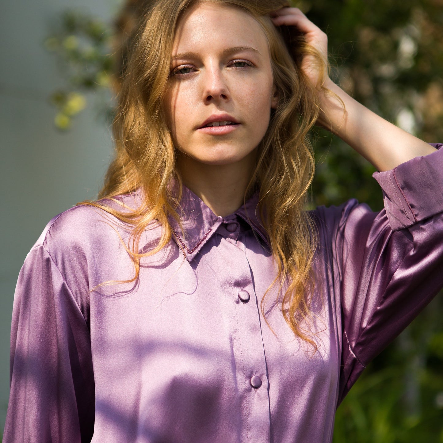 Versatile silk shirt dress featuring a classic collar with handbeaded details